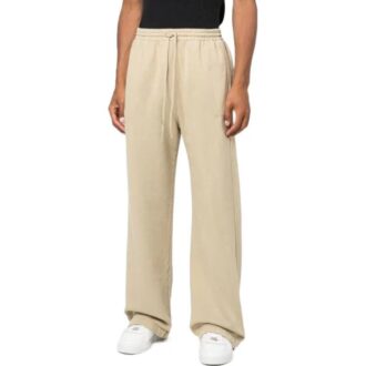 Pantalon casual droit à cordon de serrage et imprimé rayé Off-White pour homme FW22, beige