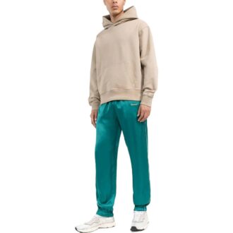 Pantalon de sport/jogging Off-White pour homme FW22 en satin avec taille élastique, version à pieds intégrés, vert Pantalon de sport/jogging Off-White pour homme FW22 en satin avec taille élastique, version à pieds intégrés, vert