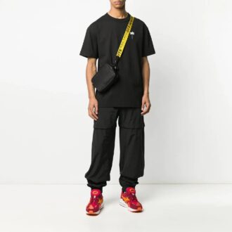 Pantalon de sport long ample Arrows Bundle Feet, noir