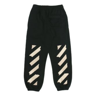 Pantalon de sport noir à rayures avec ceinture en caoutchouc noir et doré