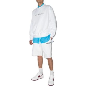 Short de sport FW21 à motif Arrows, coupe ample, blanc