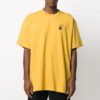 T-shirt ample à manches courtes jaune avec imprimé flèche