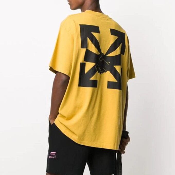 T-shirt ample à manches courtes jaune avec imprimé flèche
