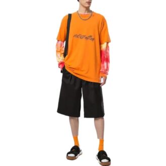 T-shirt à col rond et manches courtes avec logo géométrique en forme de flèche, orange T-shirt à col rond et manches courtes avec logo géométrique en forme de flèche, orange