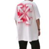 T-shirt à manches courtes blanc avec imprimé flèches au pochoir