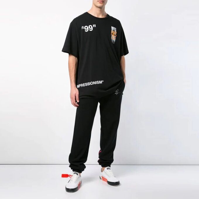 T-shirt à manches courtes en coton ample avec imprimé noir