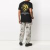T-shirt à manches courtes imprimé Terre brodé Noir